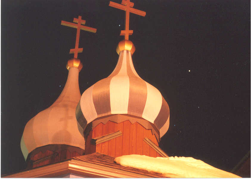 Church domes at night. Photo copyright Richard Pellessier